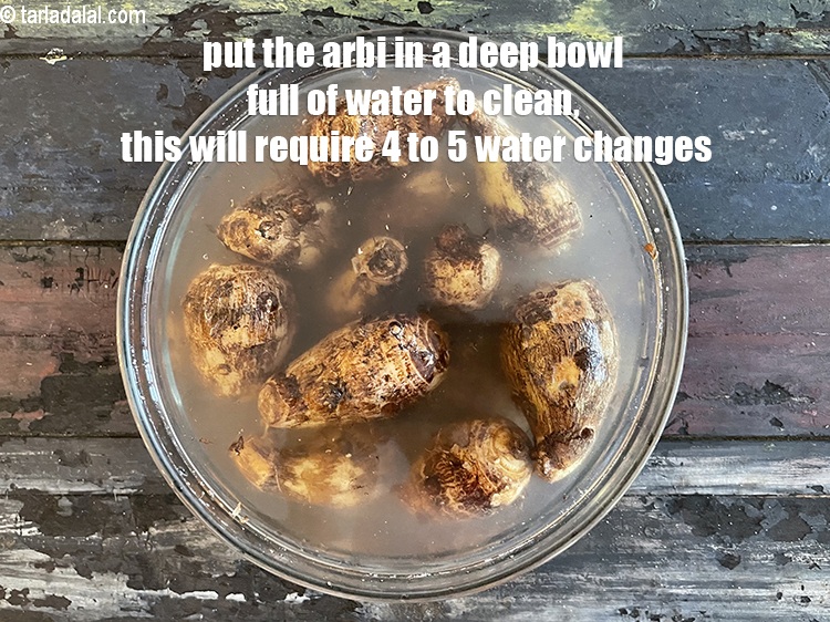 Step 5 – Put the arbi in a deep bowl of water and clean it. There is lots …