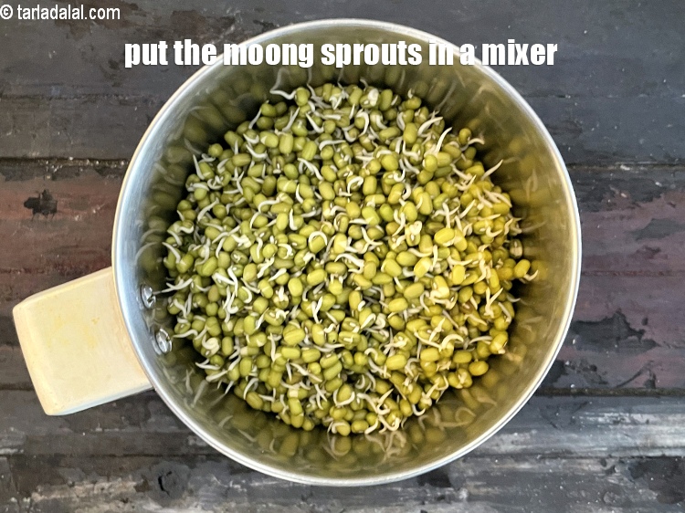 Step 4 – In a mixer put&nbsp;<meta charset="UTF-8" />1 cup&nbsp;<a href="glossary-sprouted-moong-moong-sprouts-988i">sprouted moong (whole green gram)</a>.