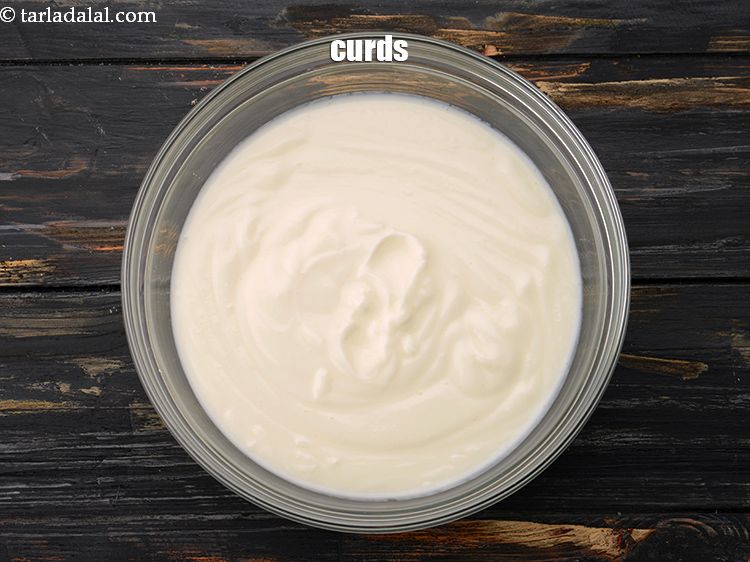 Step 3 – For the dressing of fruit raita, add 1 1/2 cups curds (dahi), beaten in a …