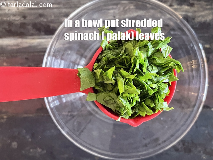 Step 4 – To make <strong>dough of hariyali roti</strong>,&nbsp;in a bowl put&nbsp;<meta charset="UTF-8" />1/4 cup&nbsp;<a href="glossary-shredded-spinach-777i">shredded spinach (palak) …