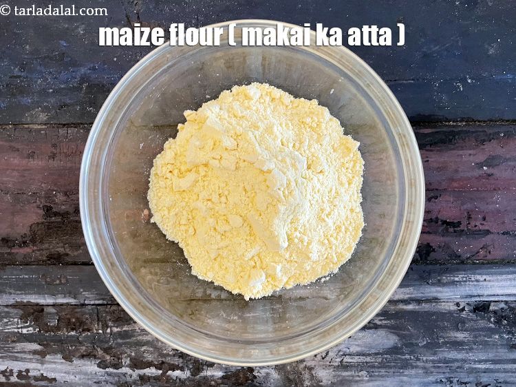 Step 5 – In a bowl put&nbsp;1 cup&nbsp;<a href="glossary-maize-flour-makai-ka-atta-makki-ka-atta-162i">maize flour (makai ka atta)</a>.
