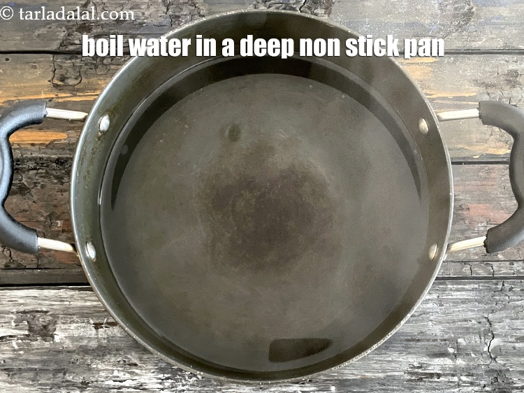 Step 3 – <meta charset="UTF-8" /> Bring water to a boil in a deep non stick pan.