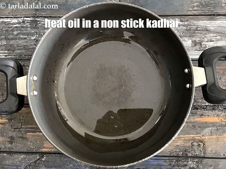 Step 6 – Heat 2 tsp oil in a non-stick kadhai.