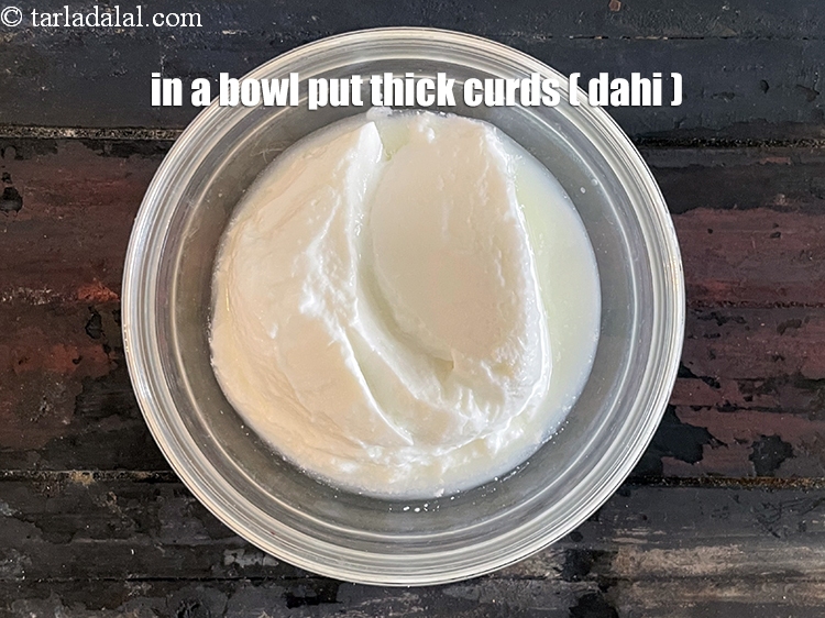 Step 12 – In a bowl put&nbsp;<meta charset="UTF-8" />3/4 cup&nbsp;<a href="glossary-thick-curds-2097i">thick curds (dahi)</a>.