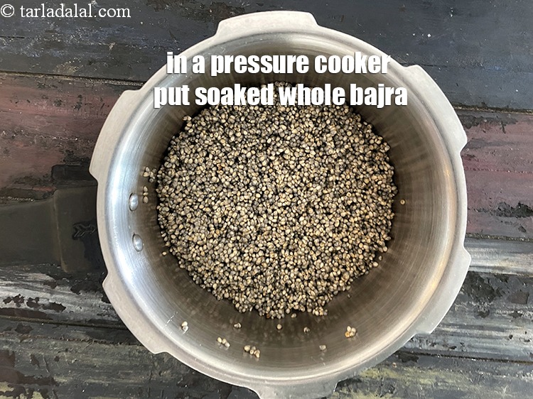 Step 10 – In a pressure cooker put 1&nbsp;cup&nbsp;whole&nbsp;<a href="glossary-bajra-black-millet-175i">bajra (black millet)</a>&nbsp;, soaked for 8 hours and drained. …