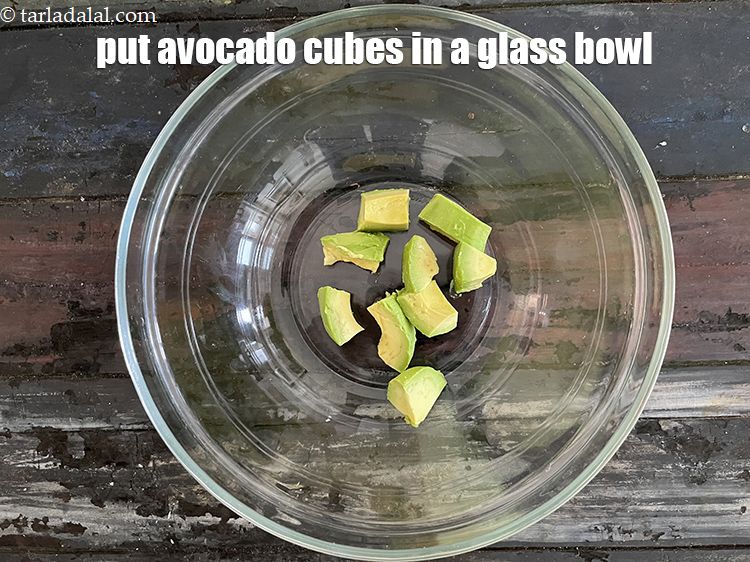 Step 17 – In a deep glass bowl put&nbsp;1/4 cup&nbsp;<a href="glossary-avocado-cubes-2499i">avocado cubes</a>.