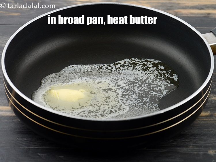 Step 3 – To make veg mayo grilled sandwich, in a broad non-stick pan, heat 1 tbsp butter.