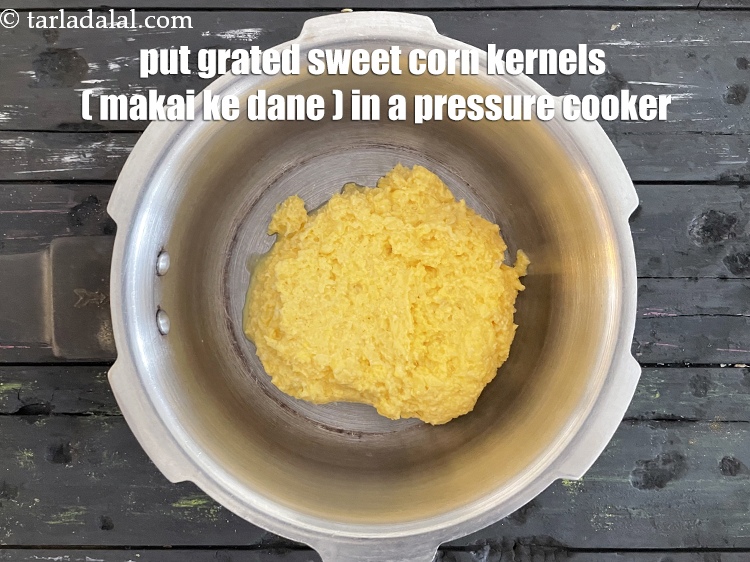 Step 3 – Put&nbsp;<meta charset="UTF-8" />1 cup&nbsp;grated&nbsp;<a href="glossary-sweet-corn-kernels-makai-ke-dane-156i">sweet corn kernels (makai ke dane)</a>&nbsp;in a pressure cooker.