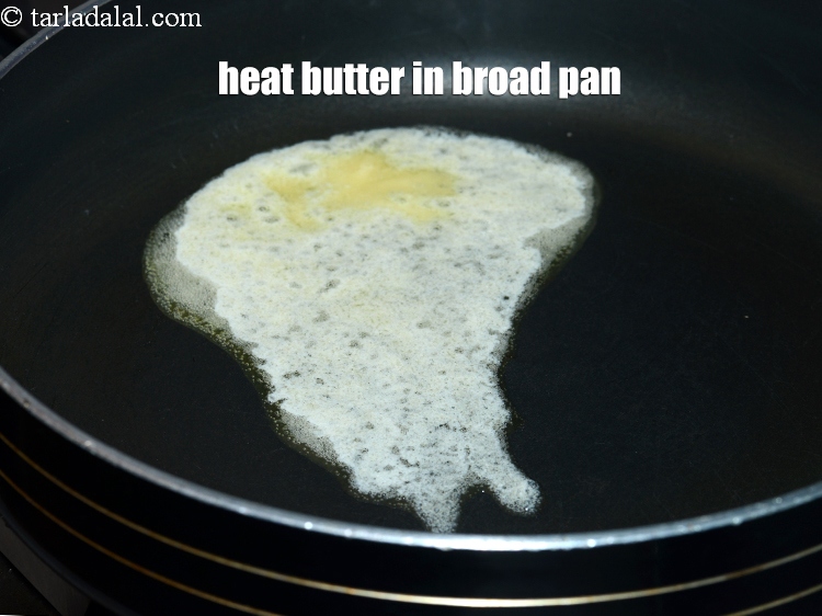 Step 3 – To make&nbsp;<strong>corn, cheese and jalapeno&nbsp;balls recipe</strong>, heat 1 tbsp butter in a broad non-stick pan.&nbsp;