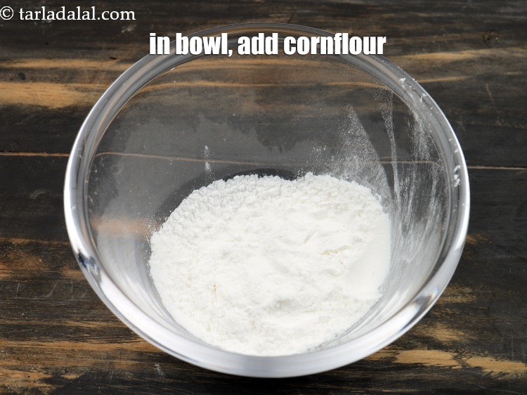 Step 4 – To make hot and sour sauce, in a bowl, add 1 tbsp cornflour.