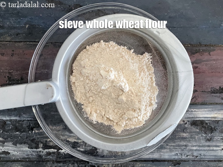 Step 3 – Sieve&nbsp;<meta charset="UTF-8" />1 cup&nbsp;<a href="glossary-whole-wheat-flour-gehun-ka-atta-gehun-ka-aata-429i">whole wheat flour (gehun ka atta)</a>.