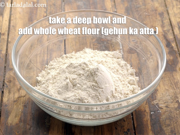 Step 10 – Take a deep bowl and add the 1 cup&nbsp;<a href="https://www.tarladalal.com/glossary-whole-wheat-flour-gehun-ka-atta-gehun-ka-aata-429i">whole wheat flour (gehun ka atta)</a>&nbsp;to …