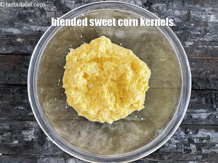 Step 9 – In a bowl put the blended&nbsp;<a href="glossary-sweet-corn-kernels-makai-ke-dane-156i">sweet corn kernels (makai ke dane)</a>.