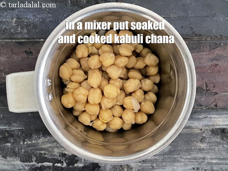 Step 18 – In a mixer put&nbsp;<meta charset="UTF-8" />1 1/2 cups&nbsp;soaked and&nbsp;<a href="glossary-boiled-kabuli-chana-1354i">boiled kabuli chana (white chick peas)</a>.