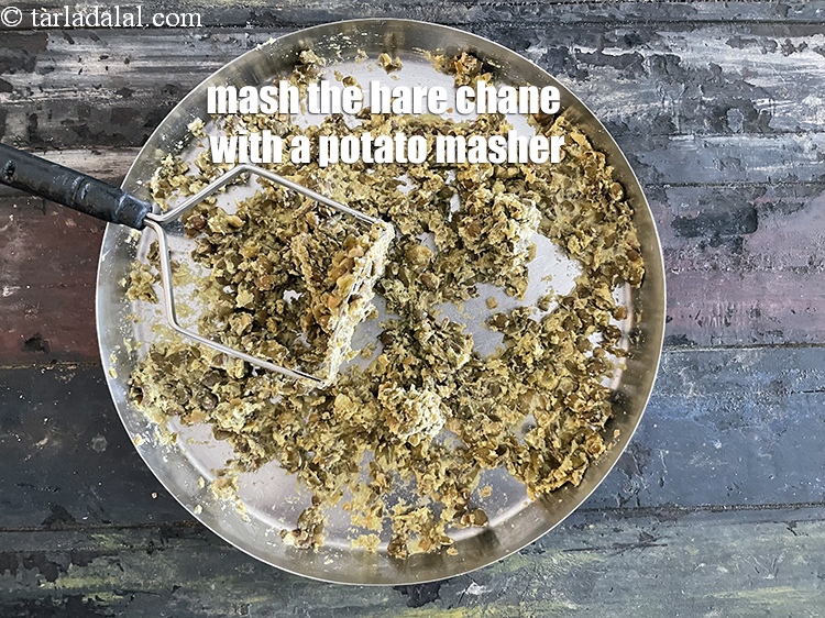 Step 18 – Mash the hare chane with the help of a potato masher.