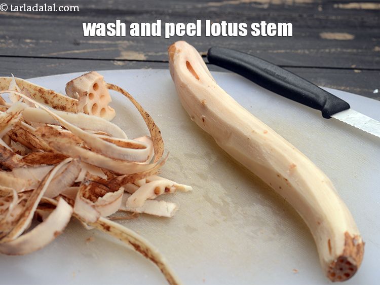 Step 3 – To make <strong>honey chilli lotus stem recipe</strong>, wash and peel the lotus stem.