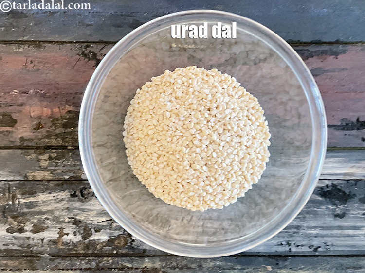 Step 9 – Put&nbsp;<meta charset="UTF-8" />1 cup&nbsp;<a href="glossary-urad-dal-split-black-lentil-941i">urad dal (split black lentils)</a>&nbsp;in a bowl.