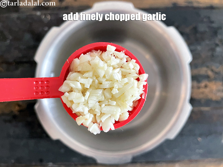 Step 11 – Add&nbsp;<meta charset="UTF-8" />1 1/2 tbsp&nbsp;finely&nbsp;<a href="glossary-chopped-garlic-790i">chopped garlic (lehsun)</a>.