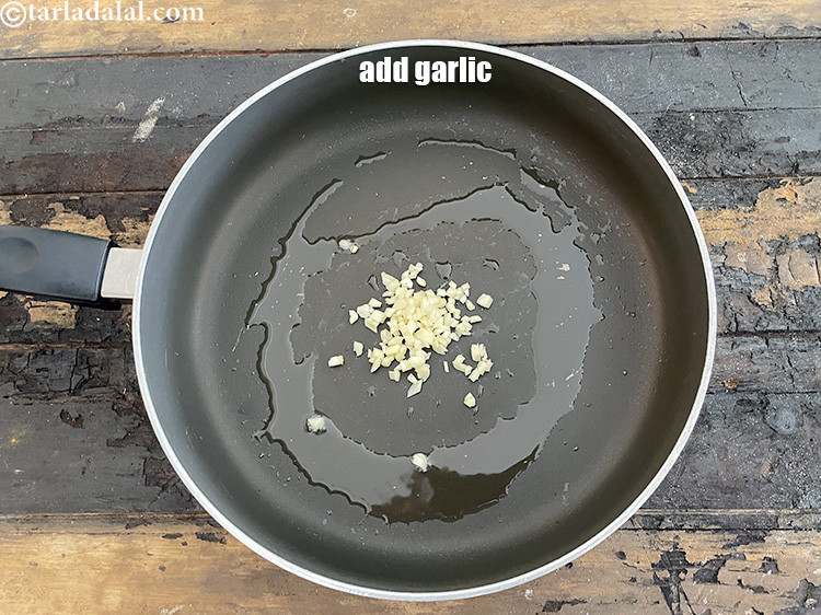 Step 10 – Add&nbsp;<meta charset="UTF-8" />2 tsp&nbsp;finely&nbsp;<a href="glossary-chopped-garlic-790i">chopped garlic (lehsun)</a>.