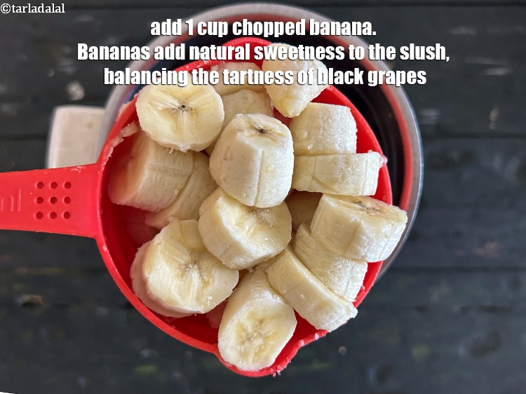 Step 5 – <html><head></head><body><p>Add&nbsp;1&nbsp;cup&nbsp;<a href="glossary-chopped-bananas-20i">chopped banana</a>.&nbsp;Bananas add natural sweetness to the slush, balancing the tartness of black grapes. …