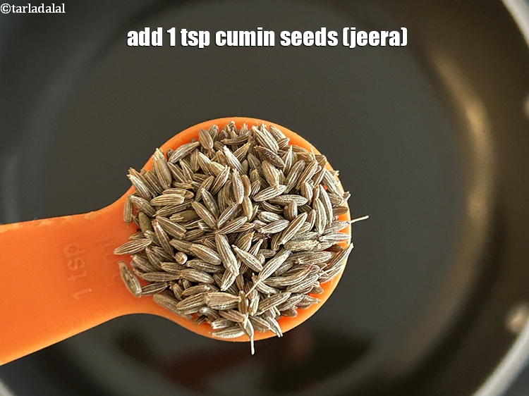 Step 4 – <meta charset="UTF-8" />Add 1 tsp&nbsp;<a href="glossary-cumin-seeds-jeera-zeera-381i">cumin seeds (jeera)</a>.