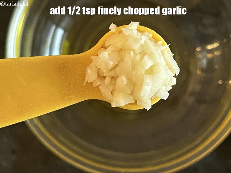 Step 4 – Add 1/2 tsp finely chopped garlic.