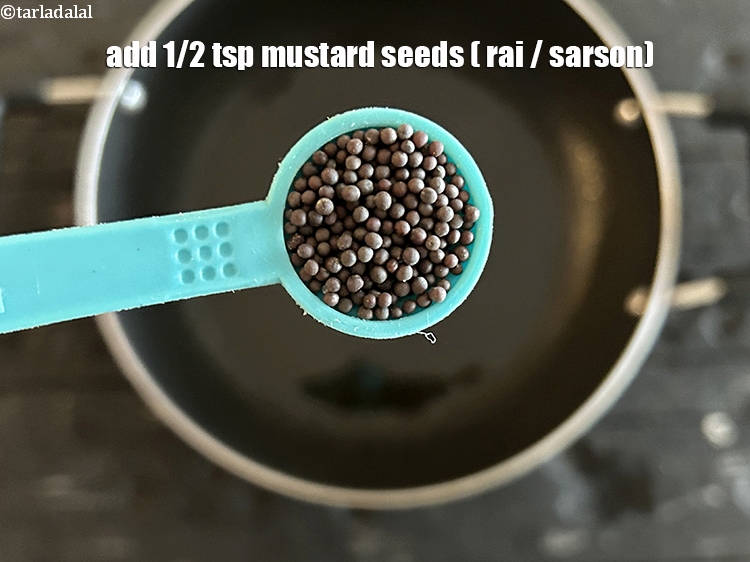Step 5 – Add&nbsp;<meta charset="UTF-8" />1/2 tsp&nbsp;<a href="glossary-mustard-seeds-sarson-rai-sarson-ke-beej-525i">mustard seeds ( rai / sarson)</a>.
