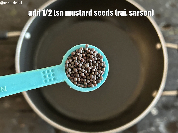 Step 4 – Add&nbsp;<meta charset="UTF-8" />1/2 tsp&nbsp;<a href="glossary-mustard-seeds-sarson-rai-sarson-ke-beej-525i">mustard seeds ( rai / sarson)</a>.