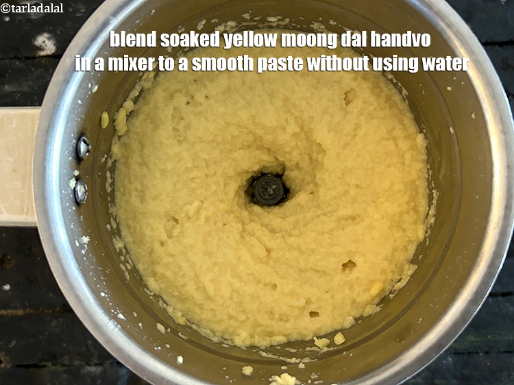 Step 11 – Blend soaked yellow moong dal handvo&nbsp;in a mixer to a smooth paste without using water.