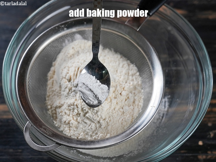 Step 4 – Add &frac12; tsp&nbsp;<a href="https://www.tarladalal.com/glossary-baking-powder-425i">baking powder</a>.