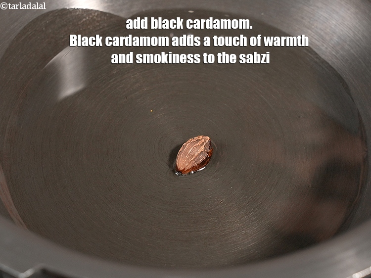 Step 4 – Add 1 <a href="https://www.tarladalal.com/glossary-black-cardamom-badi-elaichi-moti-elaichi-263i">black cardamom (badi elaichi)</a>. Black cardamom adds a touch of warmth and …