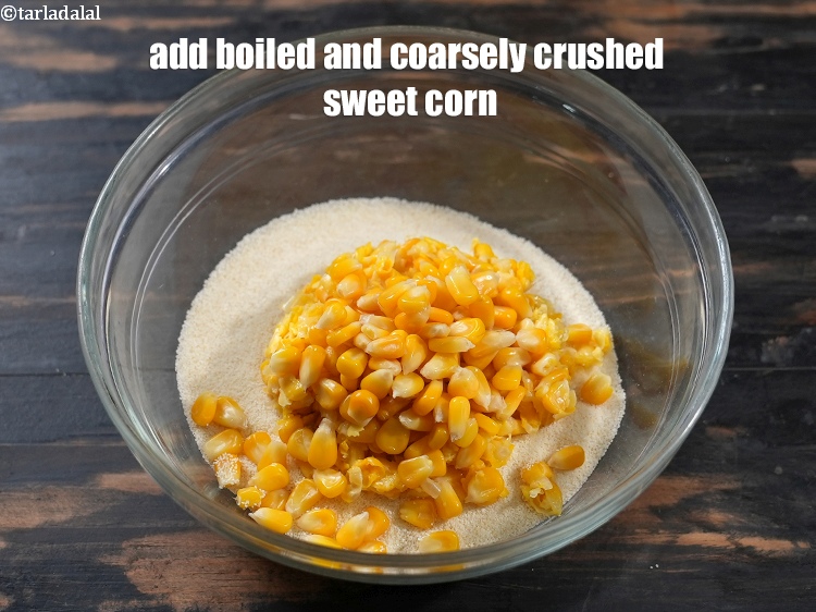 Step 4 – Add &frac12; cup&nbsp;<a href="https://www.tarladalal.com/glossary-boiled-and-crushed-sweet-corn-kernels-1930i">boiled and coarsely crushed sweet corn kernels</a>.