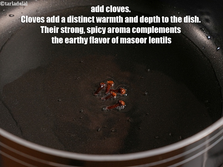 Step 4 – Add 5 <a href="https://www.tarladalal.com/glossary-cloves-laung-lavang-322i">cloves (laung / lavang)</a>. Cloves add a distinct warmth and depth to …