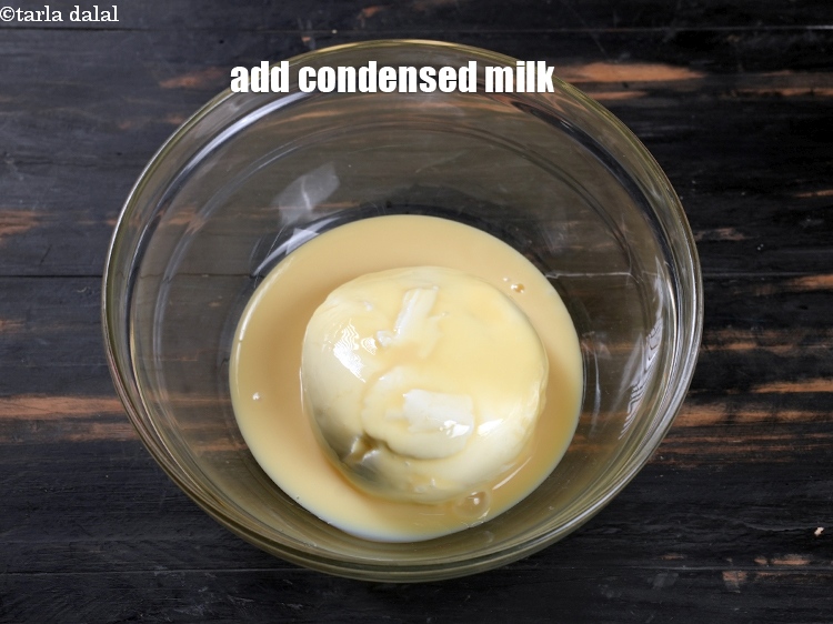 Step 4 – Add 1 cup <a href="https://www.tarladalal.com/glossary-condensed-milk-672i">condensed milk</a>.