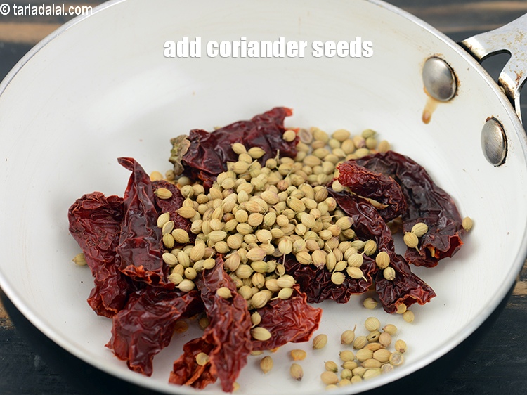 Step 5 – Add 1 tbsp <a href="https://www.tarladalal.com/glossary-coriander-seeds-dhania-ke-beej-dhania-seeds-akha-dhania-371i">coriander (dhania) seeds</a>.
