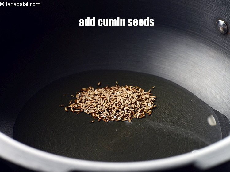 Step 4 – Add 1 tsp <a href="https://www.tarladalal.com/glossary-cumin-seeds-jeera-zeera-381i">cumin seeds (jeera)</a>.