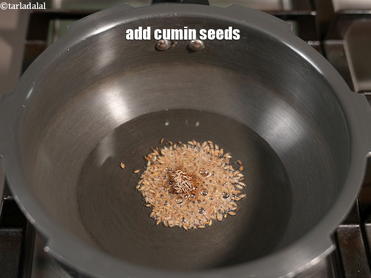 Step 4 – Add 1 tsp <a href="https://www.tarladalal.com/glossary-cumin-seeds-jeera-zeera-381i">cumin seeds (jeera)</a>.