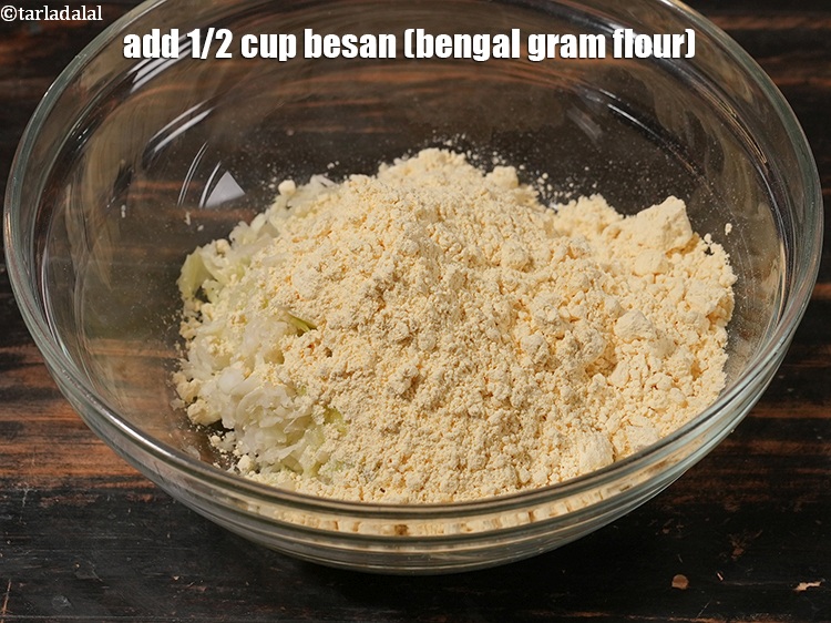 Step 18 – Add 1/2 cup&nbsp;<a href="https://www.tarladalal.com/glossary-besan-chana-dal-flour-bengal-gram-flour-952i">besan (bengal gram flour)</a>.