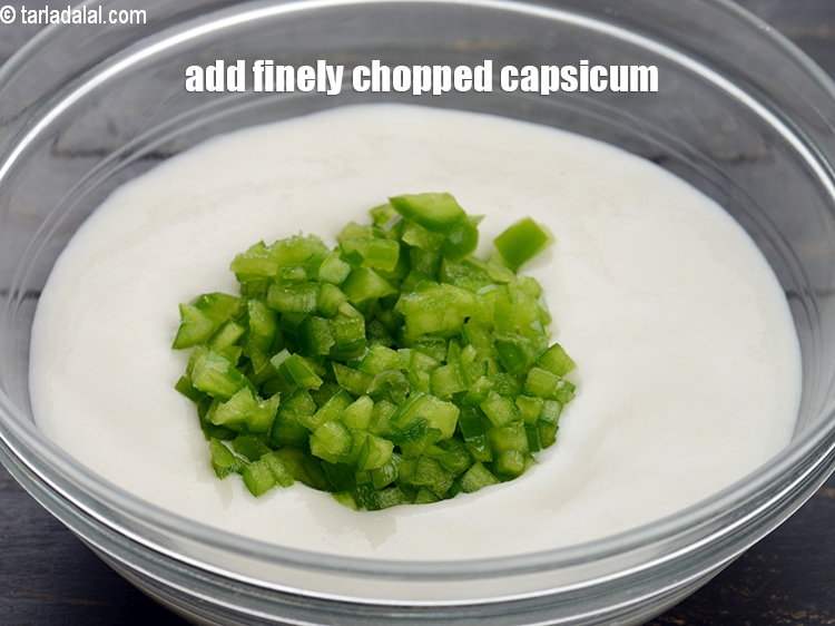 Step 4 – Add &frac14; cup finely&nbsp;<a href="https://www.tarladalal.com/glossary-chopped-capsicum-164i">chopped capsicum</a>.