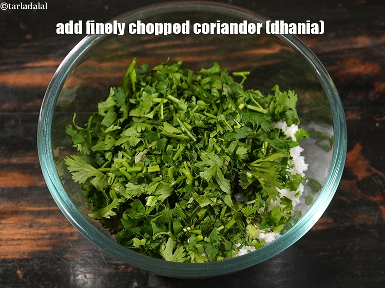 Step 5 – Add 4 tbsp of finely&nbsp;<a href="https://www.tarladalal.com/glossary-chopped-coriander-783i">chopped coriander (dhania)</a>.