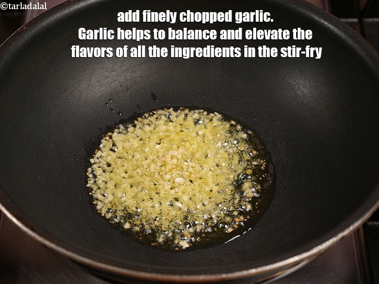 Step 4 – Add 1 tbsp finely <a href="https://www.tarladalal.com/glossary-chopped-garlic-790i">chopped garlic (lehsun)</a>. Garlic helps to balance and elevate the …