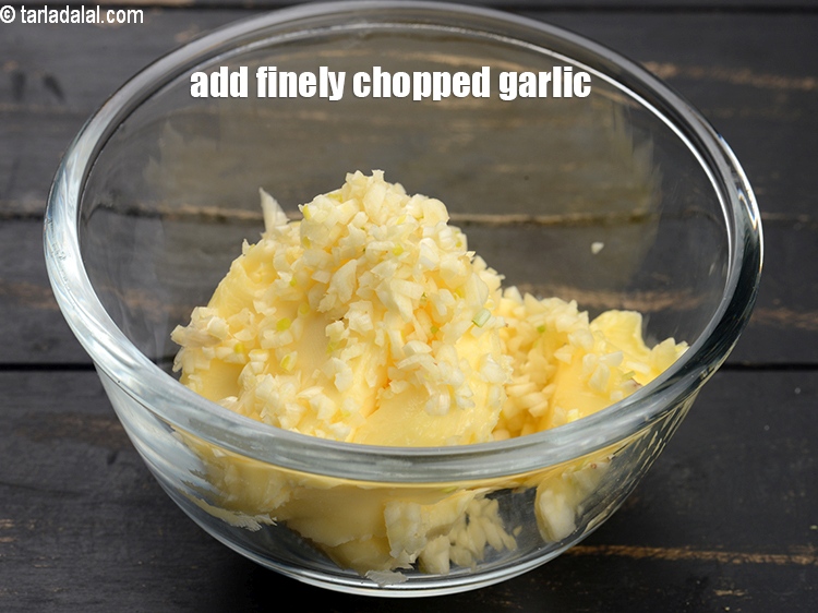 Step 4 – Add 1 tbsp finely&nbsp;<a href="https://www.tarladalal.com/glossary-chopped-garlic-790i">chopped garlic (lehsun)</a>.