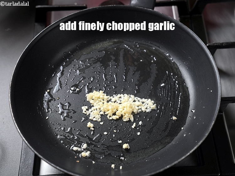 Step 4 – Add 2 tsp finely <a href="https://www.tarladalal.com/glossary-chopped-garlic-790i">chopped garlic (lehsun)</a>.