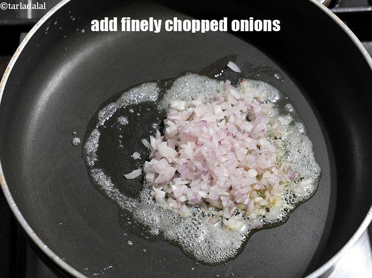 Step 10 – Add &frac14; cup finely <a href="https://www.tarladalal.com/glossary-chopped-onions-722i">chopped onions</a>.