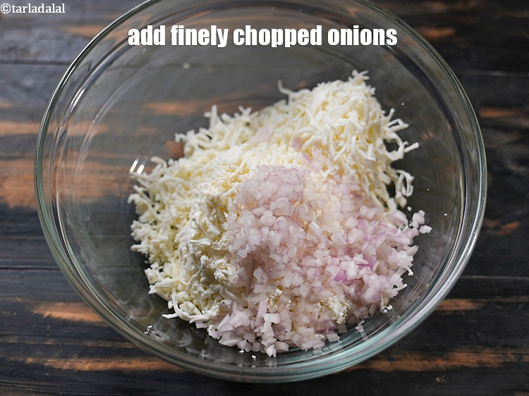 Step 4 – Add 1/4 cup finely <a href="https://www.tarladalal.com/glossary-chopped-onions-722i">chopped onions</a>.