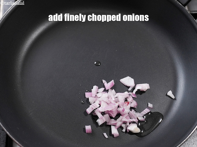 Step 4 – Add 4 tbsp finely <a href="https://www.tarladalal.com/glossary-chopped-onions-722i">chopped onions</a>.