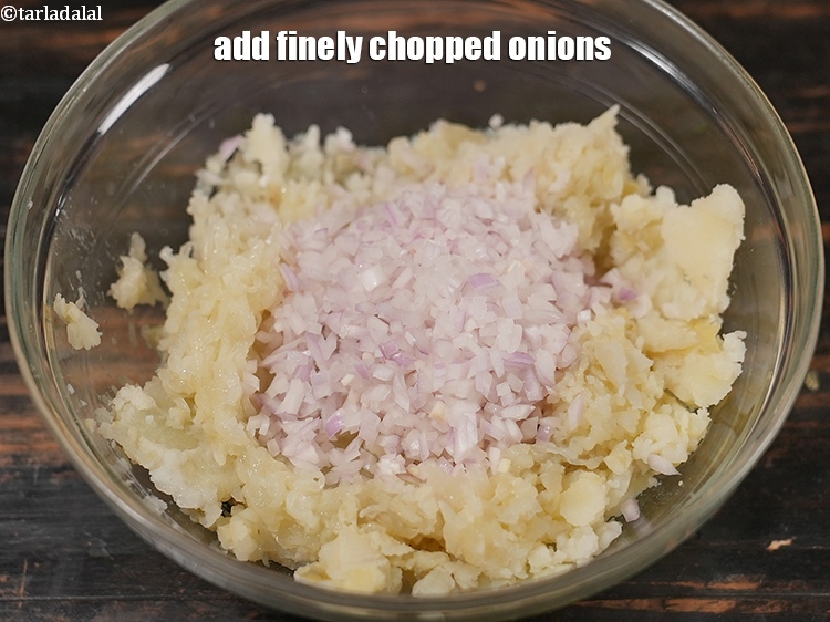 Step 4 – Add &frac12; cup finely <a href="https://www.tarladalal.com/glossary-chopped-onions-722i">chopped onions</a>.&nbsp;