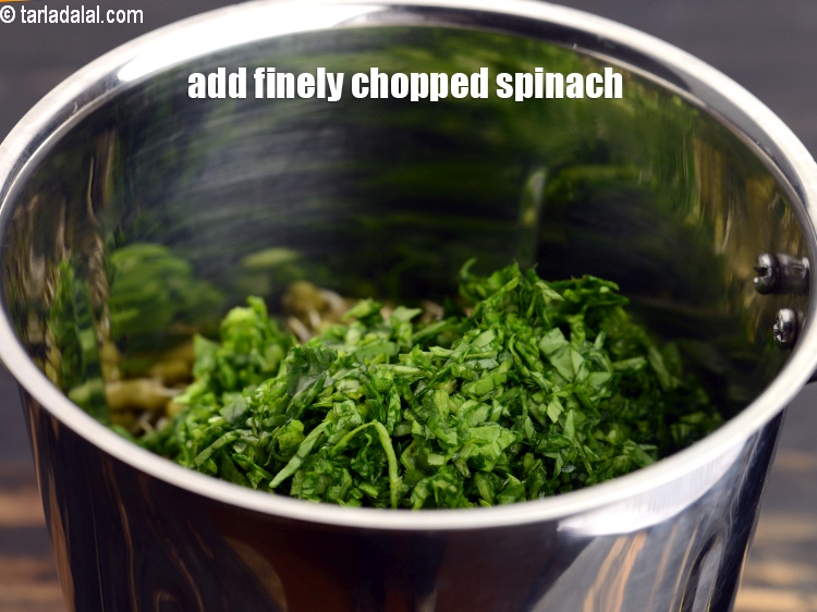 Step 4 – Add &frac12; cup finely <a href="https://www.tarladalal.com/glossary-chopped-spinach-780i">chopped spinach (palak)</a>.