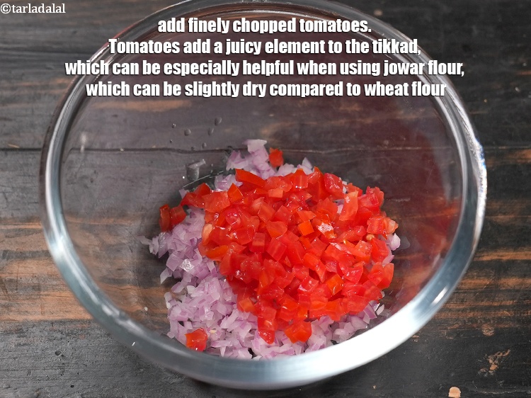 Step 4 – Add &frac14; cup finely&nbsp;<a href="https://www.tarladalal.com/glossary-chopped-tomatoes-779i">chopped tomatoes</a>. Tomatoes add a juicy element to the tikkad, which …