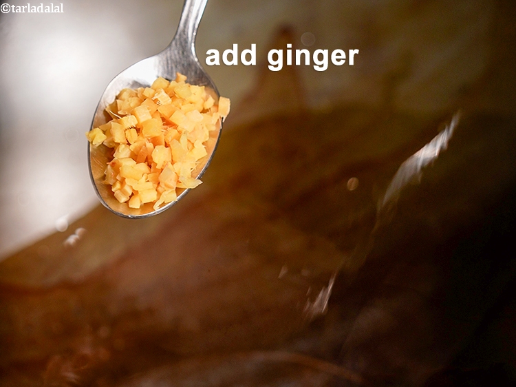 Step 7 – Add 1 tsp finely <a href="https://www.tarladalal.com/glossary-chopped-ginger-786i">chopped ginger (adrak)</a>.&nbsp;Ginger has a warm and spicy flavor that …